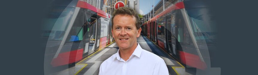 A picture of Adam Sharp of a background with some of Sydney's trains
