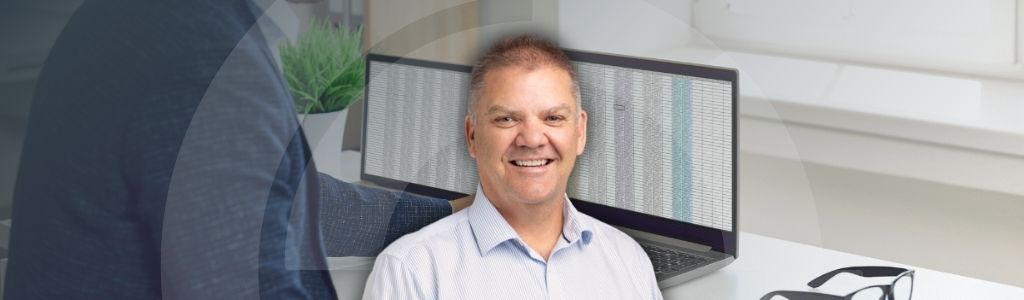 A picture of Craig Lefoe of a background data entry