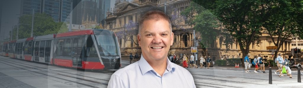 A picture of Craig Lefoe on an Sydney CBD background featuring a tram