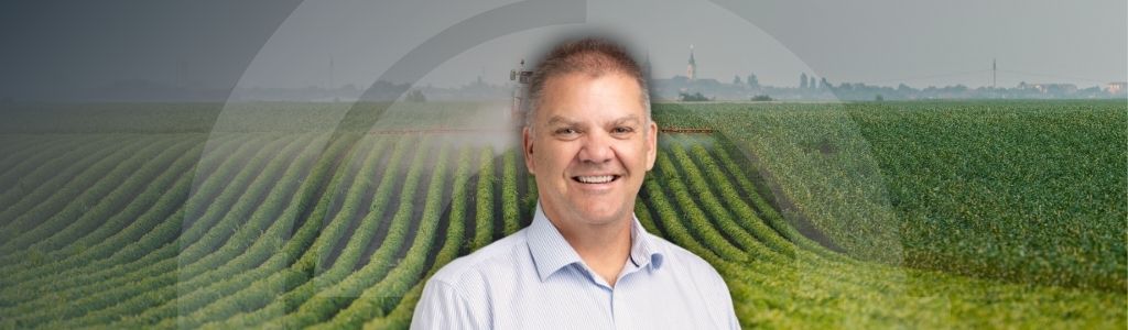 A picture of Craig Lefoe on an agricultural background