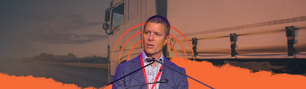 Bridging the Divide_ How EAM Software Unlocks Operational Excellence in Transportation A picture of David Lestani with a Shipping Truck background