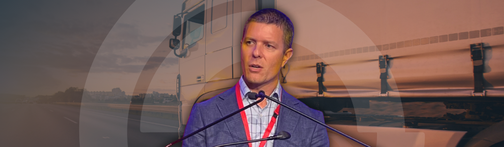 Bridging the Divide_ How EAM Software Unlocks Operational Excellence in Transportation01 A picture of David Lestani with a Shipping Truck background