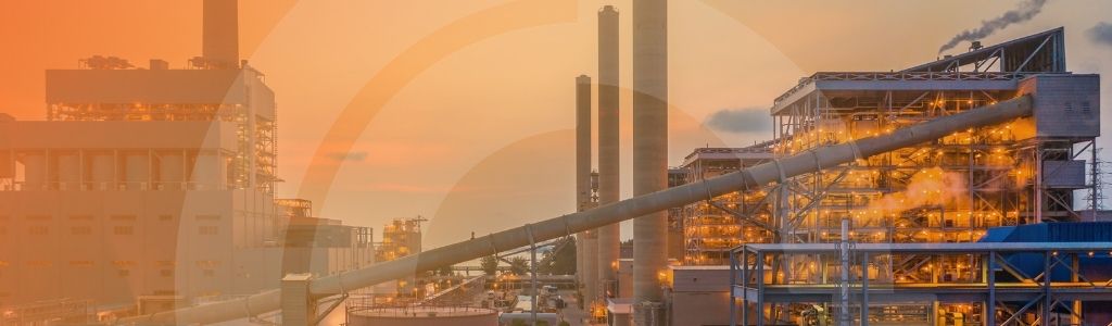 Case Study banner of a metallurgical mining facility at dusk - Arch Resources | Ellipse EAM migration and EAMaaS solution